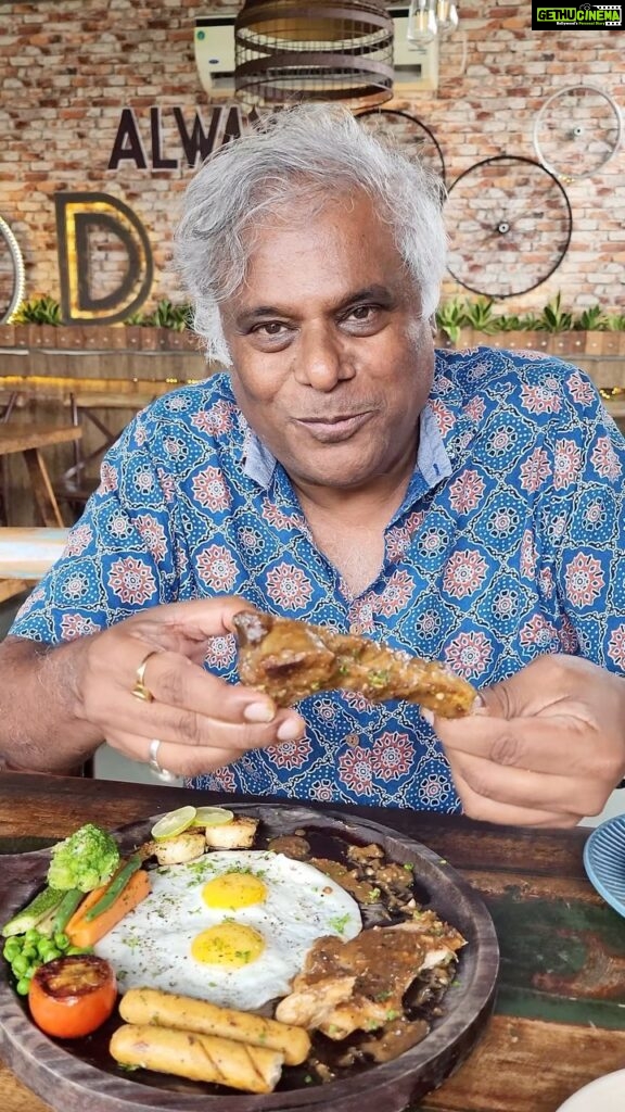 Ashish Vidyarthi Instagram - Mera toh favourite hai Mutton 🤤😍 Na-Ru-Meg Mix Grill-Perfectly cooked Juicy Mutton , Tender chicken with some amazing spicy and tangy sauce, Sausages, Half fried egg, Vegetables and Tomatoes and much more 😌 Ohhhhhooooohooooo zone mein hai bhai A Special New Menu at @cafenarumegkolkata Do visit this amazing cafe with great food and ambience ❤️ Address-Café Na-Ru-Meg: 3rd Floor, 56A, Raja Basanta Roy Rd, Lake Market, Kalighat, Kolkata, West Bengal 700029 Video Credit @ru.pa.li.73 🤗 #reelitfeelit #foodreels #kolkata #reelkarofeelkaro #foodie #grilled #grillchicken #cityofjoykolkata #love #food #happyplace #narumeg #actorslife #kolkatadiaries #nameg #rupalibarua #ashishvidyarthi #vlog #grillvegetables #cafe