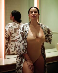 Elena Roxana Maria Fernandes Instagram - Leave a little sparkle everywhere you go!
.
.
.
Photographer: @guzal_photography 
Bodysuit: @skims 
Gown: @siamesedreamsofficial 
@goodsagency 
Earrings: @pats_vintagejewelry 
.
.
#sparkle #beauty #glam #shine #bodypositive #fashion #style #mirror #pose #ootd #outfitoftheday #beautiful #shoot