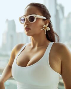 Elena Roxana Maria Fernandes Instagram - Shine on! 🌟 . . . Photographer: @monamunshi Outfit: @adanola Shoes: @staud.clothing Sunglasses: @akila.la @goodsagency Earrings: @pats_vintagejewelry . . #shine #sun #shades #glam #love #ootd #outfitinspiration #outfitoftheday #shoot #shootdiaries #travel #traveldiaries #fashion #style #bodypositive