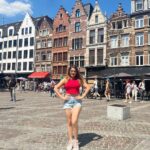 Karunya Ram Instagram - Belgium ur awesome 🇧🇪❤️🥰♥️ : : 👚 @mango 🩳 @zara 👟 @jumpman23 🕶 @dolcegabbana : : #karunyaram #milkybeautykarunyaram #actress #europe #travel #vacation #belgium #tomorrowland #festival Antwerp, Belgium