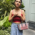 Namita Krishnamurthy Instagram - Swipe to the end for a surprise (aka the emotional blackmail it takes to get photos for the gram) Also, how cute is my thrifted fit ♥️ Top: @dealsnsteals.in_ Skirt: @custo_mizedthrift Bag: @ilimi_collection #outfitoftheday #fitcheck #coffeedate #curlyhead #namitakrishnamurthy Amethyst