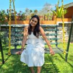 Poornima Ravi Instagram - Stretch back and swing to fly higher 😊❤️ . . . . . . . . . . . . . #poornimaravi #araathi #whitegown #white #whiteoutfit #whitedresses #love #ooty #swing #smile #loveyourself #lovestory #happy #fashionphotography hionphotography #candid #candidphotography