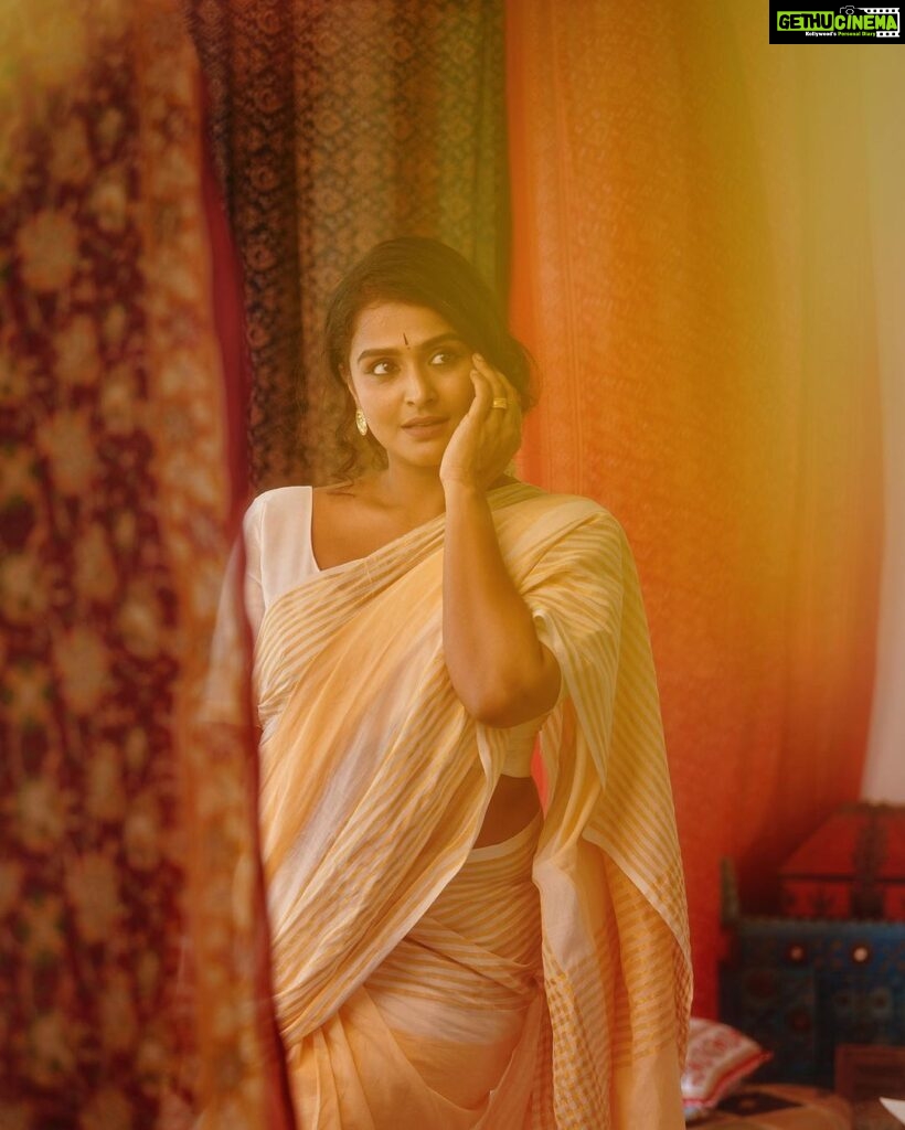 Remya Nambeesan Instagram - “MOHAM” She dwells in a wistful echo, of an old school self. Her heart like a brass vessel, cradling ancient memories. She waltzes between two realms, a dance of time beneath the sun. Photography - @plan.b.actions HMUA - @jo_makeup_artist Concept & Styling - @arjun_vasudevs Styling team - @_anaaaaan_ Saree - @roukabysreejithjeevan Ernakulam City, Kerala