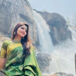 Shirin Kanchwala Instagram - She’s got oceans tucked away in her hair, Poems swim under her skin💚 Athirappilly Falls