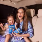 Smriti Khanna Instagram - Road trip essentials for our family? GERBER Puffs all the way! 🚗 Snack time just got an upgrade for our adventure-packed journey. GERBER Puffs are a win-win – fruity and delicious + a source of fiber - making me and Anayka 🤩 Made with multigrains like oats, wheat & rice, they're the perfect crunchy and nutritious treat for our little explorers. 🌾 Get ready to snack smart on the road and Grab your GERBER Puffs today! Proud member of the #TheVillagebyGERBER Disclaimer: This picture was clicked before starting the trip. Kindly ensure seat belt is fastened while the vehicle is moving #gerberpuffs #gerbersnacks #anythingforlittleones #Gerber #GerberIndia #thevillage#thevillagebyGerber