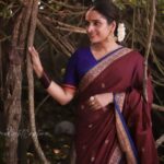 Surabhi Lakshmi Instagram - സാരികൾ കഥപറയുംപോലെ 💜🧿❤️ Photography @limelightcapture Wardrobe. @silk_mandir Hair & makeup. @makeover_by_sanaah Ornaments. @golden_cup_fashion_jewellery blouse design @celebrate_clothes_n_crafts ❤️ @mangala_raghu #saree Valayanad Devi Temple