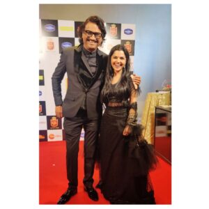 Aarya Ambekar Instagram - #LongPostAlert #AjayDadaAppreciationPost😁❤️
While surfing through the Gallery to find some pics in Black for Sankranti, I came across this pic clicked last month. And it dawned on me that coincidently, today marks #OneYear to getting to sing for Ajay-Atul! All the memories of Ajay dada teaching the song to me, to being with me in the recording room during the entire recording process, patiently correcting me until I matched his level of precision, flashed before my eyes. 
From then, till now..whatt a year it has been, thanks to this person's existence!!✨ And it definitely calls for an appreciation post!

I'll always be grateful to 2021 for introducing me to this gem of a person who in no time became my best friend, philosopher, guide in literal sense. My rock solid pillar of support and most trustworthy person who I completely trust with for selfless advices. The only person who has the right to scold me and whose scoldings I take seriously!😁🙈
Who I can count on for honest musical comments and whose wholehearted appreciation is something that makes me work hard! 

Those who know me, know very well that I prefer a short text over calls..Always! There are very few people I can comfortably talk with, on calls. 
He definitely tops the list!! The call-notif I get excited on seeing, because I know when he calls, some intellectually and musically rich n nourishing, mentally stimulating conversations and food for thought is on its way!!😄
Or if I have any doubt (relating to any topic ranging from Music to Politics) I know whom to call and get satisfactory answers from!
Not to forget, all this, in addition to giggles to his (sometimes good) punches😝 and laughters until you can't breathe, to his hilarious remarks on something he's angry about!!😂
This has been such a routine that now whenever my parents hear a hyena-like laugh from my room, they also guess its him and ask me "Kay mhanat hota Ajay Dada?!"😂

Words fall short to write about and thank this person!!! While I write all this, n no. of other memories are popping up in my mind and making me smile wide!!
Thank you for being you dear Ajay dada!!✨❤️
.
.
.
_
#ajaygogavale #ajayatul