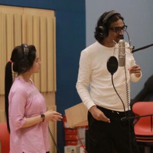 Aarya Ambekar Instagram - #LongPostAlert #AjayDadaAppreciationPost😁❤️
While surfing through the Gallery to find some pics in Black for Sankranti, I came across this pic clicked last month. And it dawned on me that coincidently, today marks #OneYear to getting to sing for Ajay-Atul! All the memories of Ajay dada teaching the song to me, to being with me in the recording room during the entire recording process, patiently correcting me until I matched his level of precision, flashed before my eyes. 
From then, till now..whatt a year it has been, thanks to this person's existence!!✨ And it definitely calls for an appreciation post!

I'll always be grateful to 2021 for introducing me to this gem of a person who in no time became my best friend, philosopher, guide in literal sense. My rock solid pillar of support and most trustworthy person who I completely trust with for selfless advices. The only person who has the right to scold me and whose scoldings I take seriously!😁🙈
Who I can count on for honest musical comments and whose wholehearted appreciation is something that makes me work hard! 

Those who know me, know very well that I prefer a short text over calls..Always! There are very few people I can comfortably talk with, on calls. 
He definitely tops the list!! The call-notif I get excited on seeing, because I know when he calls, some intellectually and musically rich n nourishing, mentally stimulating conversations and food for thought is on its way!!😄
Or if I have any doubt (relating to any topic ranging from Music to Politics) I know whom to call and get satisfactory answers from!
Not to forget, all this, in addition to giggles to his (sometimes good) punches😝 and laughters until you can't breathe, to his hilarious remarks on something he's angry about!!😂
This has been such a routine that now whenever my parents hear a hyena-like laugh from my room, they also guess its him and ask me "Kay mhanat hota Ajay Dada?!"😂

Words fall short to write about and thank this person!!! While I write all this, n no. of other memories are popping up in my mind and making me smile wide!!
Thank you for being you dear Ajay dada!!✨❤️
.
.
.
_
#ajaygogavale #ajayatul