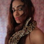 Aiswarya Suresh Instagram - Shot by @koshi____ 💚 ( Yes it's a real python of @kevin_antony_ ) Kerala