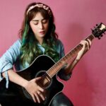 Angela Krislinzki Instagram - Lockdown has taught me so much. Learning is living and the possibilities are infinite. Learning guitar for now hope i master it soon. Home Sweet Home