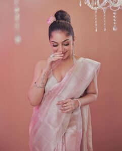 Arya Instagram - I love it …
I draped it … 

Saree @kanchivaram.in 
MUA @shoshank_makeup 
Styling @sabarinathk_ 
Draping @draping_damini 
Jewelry @goodwillcollectionskerala 
Photography @plan.b.actions @jibinartist 
Asst @dayonphotos 
Art @silvester_attractte 
Studio @maxxocreative 

#trendingnow #saree #sareelovers #drape #silk #tissue #fashion #makeup #aryabadai #pastel #happiness #kanchivaram
