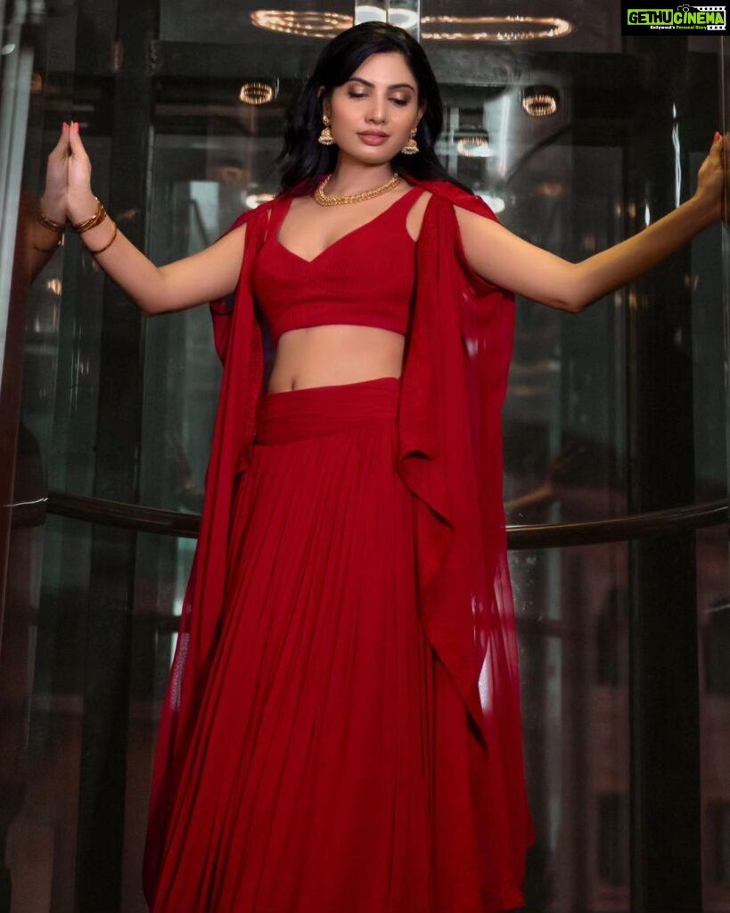 Avani Modi Instagram - "Adorned in a breathtaking red lehenga, our award-winning actress is a true vision of beauty! 🌟 Let's celebrate her well-earned accolade! 🏆❤ #AwardWinner #RadiantElegance #RedLehengaGoals" Styling: @beingstyl Assist Stylist: @gummadimeghana Outfit: @tirabynareshraj Photography: @lakshman_murthy99 , @chandu_chinna_creations Filmnagarclub