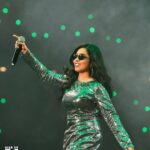 Haripriya Instagram - Longggggg drive.. 💚🔫🪩 #throwback to this madness!! . . . #Haripriya #haripriyasinger #u1 #yuvanliveinsingapore2023 #live #performer #singer Singapore