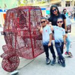 Kanchi Kaul Instagram - This February Sunday is a permanent mark on our calendars, every year!!! The atmosphere of seeing so many artists come together to present some really cool , beautiful , out of the box art installations in the most historic part of the city on the roads, out in the open , is always a pleasure and this year was no different. Pepsi cola for 50 paise outside school was my version of junk joy in my childhood. Never would it have crossed my mind that I would repeat that with my boys decades later and enjoy it even better 😀 This years theme was “ past forward” and of course had a lot to do with sustainability . To get into somebody else’s mindset into creating an art piece is an amazing journey and learning in itself. Something every child, every human should be exposed to. The childrens museum had some wonderful art exhibits put up by various schools around the city , all put in their collective , artistic and sustainable efforts for everyone to experience . Sitting in the open , listening to stories, surrounded by other kids, grasping it all in ❤️‍🔥 Walking through a museum with stuffed animals , used for research and study, we learnt so many new things including that this art is called #taxidermy . The day ended with a carnival at the derby. The beautiful sport of horse racing, (thank you dad 💖) learning about horses , their behaviours, their track records,how they train, and show off that insane horse power, so majestically. Just marvellous!!!! Although all exhibits were outstanding , Slide 7 really resonated with us …. Footwear is something constant throughout our life journey just like lifes highs and lows . coming down the slide is always a joyous moment, so in life’s journey, even when we go through the low phases , let us feel like we’re going down the slide and enjoy even that so that we learn some thing out of the experience and come out better from it “सुख” so much to be thankful for, always! #onelife #happydays #makethemostofit #peace #explore #art #artfestival #kalaghoda #derby #horseracing #carnival #theadventuresofAI #neveradullmoment #thebeautyofeverything #gadgetfreechildhood #grateful