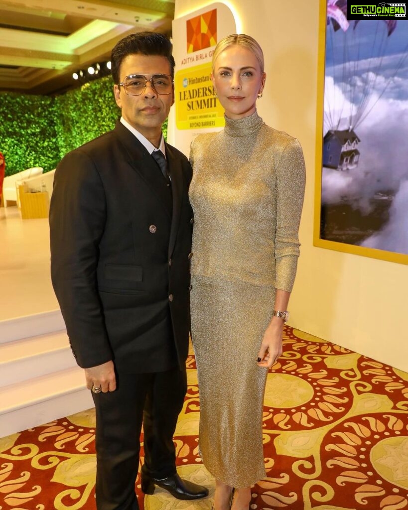 Karan Johar Instagram - Had the pleasure and privilege of being in conversation with the absolutely lovely and stunning @charlizeafrica …. At the #htleadershipsummit She was so eloquent, warm and so compassionate … styled by @ekalakhani 📷 @sheldon.santos