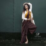 Meenakshi Raveendran Instagram - Kick the pleats of sheer elegance Mua @makeover_by_mufeee Concept and styling @amruthaappu @amal_gop Costume @vogue_designer_studio @zelah.and.i Costume assist @apolloblithe Photo @maplestories__ @cathmediastories @nithinsundher_photography Cinematography @the_oceaneyes_studio @_dytr_