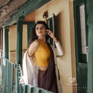 Meenakshi Raveendran Instagram - Kick the pleats of sheer elegance 

Mua @makeover_by_mufeee 

Concept and styling @amruthaappu @amal_gop 

Costume @vogue_designer_studio
@zelah.and.i 

Costume assist @apolloblithe

Photo @maplestories__ 
@cathmediastories 
@nithinsundher_photography

Cinematography @the_oceaneyes_studio
@_dytr_
