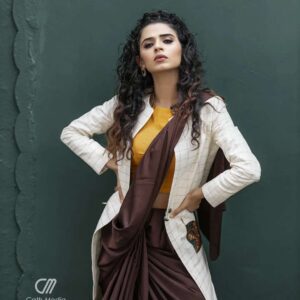 Meenakshi Raveendran Instagram - Kick the pleats of sheer elegance

Mua @makeover_by_mufeee 

Concept and styling @amruthaappu @amal_gop 

Costume @vogue_designer_studio
@zelah.and.i 

Costume assist @apolloblithe

Photo @maplestories__ 
@cathmediastories 
@nithinsundher_photography

Cinematography @the_oceaneyes_studio
@_dytr_