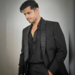 Neil Bhatt Instagram - Black raised to ♾️!! Styled by- @purvabansal5 Outfit by- @mehboobsons Picture courtesy- @creative_babu_01 #neilbhatt #aishwaryasharma #bombaytimesfashionweek2023 #black #maninblack #womaninblack #couplegoals❤ #neilkiaish