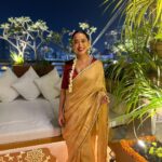 Sayani Gupta Instagram - The night that started well.. well, well! Wanted to wear gold. Kanu sent me this beautiful @raw_mango tissue. Styled myself with the gorgeous @curiocottagejewelry & did my hair make up. Gajra for the win always! #nofilter At @minimathur ‘s beautiful terrace clicked by @sairahkabir 🌟 PS: please don’t ask lipstick shades. There are 5 in there. Thank you! Have the best Diwali! 🪔💫✨