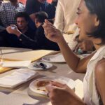 Sayani Gupta Instagram - Cause there’s no one like him! I believe he has a God particle in him! 1. He asked to take a photo when I told him I was the only one without a photo with him after so many years! @ayushmannk very sweetly clicked it! I didn’t even have my phone! 2. Puffy face in a London morning! His jawline still chiseled! 3/4. London morning shoot in the streets! @raajluv & Arun always smiling! 5. Couldn’t stop eating! Had my mouth and hands full with Biriyani while he came to hug me! He laughed! Others gasped! 😅 6. Still stuffing my face shamelessly! Also smiling cause he said he read my @outlookindia article on him and said thank you! He is sweeter than all the jalebis of the world put together! I had an opportunity recently to work with him again.. unfortunately couldn’t do it! I hope we get to make something crackling again! This time.. a super duper hit! Inshallah! 🤞 Happy SRK day everyone! We lucked out that he is ours! 💫✨♾️