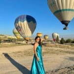 Tanya Sharma Instagram - “Love at the lips was touch As sweet as I could bear And once that seemed too much I lived on air.” #turkey #cappadocia #hotairballoon #tanyasharma #gown #instagram #instafashion #gratitude