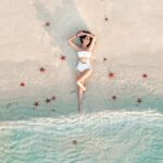 Aakriti Rana Instagram - The pictures that he clicks of me with our drone ❤️🥹 From a person who never cared about taking pictures to someone who loves taking videos and photos just cz he found a toy (drone) he is absolutely thrilled about 🤣🤣 📍 Phu Quoc, Vietnam #aakritirana #aakritiandrohan #drone #djimini3pro #dronephotography #photoshootideas #couplephotography