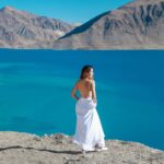 Aakriti Rana Instagram - Had to drive the @landrover_in Defender at Pangong wearing a gorgeous white lehenga! This place truly looks unreal! Such a vibe🔥 📸 Shot by @vikrantdate @advait_bartakke #DefenderJourneys @Cougar__Motorsport #CougarMotorsport #partnership #aakritirana #landroverdefender #defender #pangonglake #pangongtso #incredibleindia #travelblogger #indiantravelblogger #lehenga #indianoutfit #reelsindia Pangong Lake, Ladakh