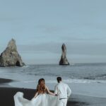 Aakriti Rana Instagram - 📍Reynisfjara Black Sand Beach, Iceland We did our Pre Wedding Shoot at The MOST BEAUTIFUL and the DEADLIEST BEACH of Iceland! People who get caught in a sneaker wave find escaping back to shore extremely difficult - and with a water temperature just a few degrees above freezing, hypothermia can set in quickly, leading to fatalities. To be safe, check the warning sign and the red, orange and yellow lights while entering. Stay away from the zones the light for which light up. 📸 @believecollective @ujjwalvanvari #aakritirana #aakritiandrohan #iceland #reynisfjarabeach #blackbeachiceland #deadly #exploreiceland #icelandtravel #indiantravelblogger #preweddingshoot #preweddingphotography #reelsinstagram