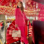 Aashika Bhatia Instagram – Embracing the vibrant hues and feeling fabulous in pink amidst a fiery red backdrop 🔥💕