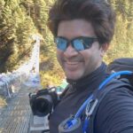 Abijeet Duddala Instagram - Crossing bridges one at a time.. Here, the legendary Hilary step 🏔️ #hillarystep #himalayas #everest #mountains #river #valley #nature #bridge #trail #outdoor #travel #wanderlust #travelgram #getoutdoors