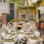 Alanna Panday Instagram - Transformed my home into the cutest little Italians farmers market for our Haldi 🌼🌻 We met @thea3project a year ago and told them much we love to travel and how we want each wedding event to remind of us of a place we love the most. We worked together for almost a year to make this vision come to life! When guests first walk in they got to pick up little baskets to take home organic goodies displayed on wood shelves. We had a little gelato stand to the left with freshly made ice cream and a long grazing table in the middle to start of the celebration with an intimate brunch. My favourite part was probably the flower stand where guests could make their own bouquets to take home. The back of the yard featured an olive tasting bar and the most beautiful gradient floral wall. The inside of the house had a live pizza station and bar with Italian themed drinks. No amount of content can do justice to how beautiful the decor turned out! Florals by @blacktulipflowers_india