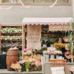 Alanna Panday Instagram - Transformed my home into the cutest little Italians farmers market for our Haldi 🌼🌻 We met @thea3project a year ago and told them much we love to travel and how we want each wedding event to remind of us of a place we love the most. We worked together for almost a year to make this vision come to life! When guests first walk in they got to pick up little baskets to take home organic goodies displayed on wood shelves. We had a little gelato stand to the left with freshly made ice cream and a long grazing table in the middle to start of the celebration with an intimate brunch. My favourite part was probably the flower stand where guests could make their own bouquets to take home. The back of the yard featured an olive tasting bar and the most beautiful gradient floral wall. The inside of the house had a live pizza station and bar with Italian themed drinks. No amount of content can do justice to how beautiful the decor turned out! Florals by @blacktulipflowers_india