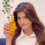 Anahita Bhooshan Instagram - So I decided to try the all new renovated @lorealparis Extraordinary Oil Serum and I absolutely love how my hair feels! I love that it helps eliminate the frizz completely and also helps protect against UV, humidity and pollution. Infused with the goodness of 6 different floral oils, this serum makes my hair 30% stronger and provides 24H shine and softness! #ExOilSerumToShine Tags and Hashtags: @lorealparis @amazonfashionin #Collab #ExOilSerumToShine #ExOilSerum #lorealparisindia