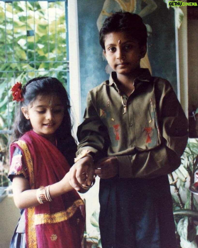 Bhakti Kubavat Instagram - That was my childhood - simple & beautiful - just like a bed of roses. On the left is my mama’s son sunny! The elder brother who was so much fun. We would get chocolates from Tanzania and my nani would send us frocks & games. We were so excited when he would visit us. Next to him is Kanjibhai - the first caretaker who stood next to my dad when he opened his first clinic. My dad taught him everything, from taking an ecg to protecting us when he was not around saving lives. Ofcourse next to him is me - with a red rose and gulabi lipstick, yes i was allowed to wear makeup on special occasions like rakshabandhan, diwali & my birthday, haha. By my side is my twin brother and my partner in crime. For me he was my hero - whatever vicky will do - i WILL do. We would go to school in ghoda-gadi, play playstation, nintendo, cricket & our favorite was “nadi-parvat”, keep the coins on a railway tracks, chill will “kaju”. And above him is Didi - always protective & always helping mom. She would burn bridges if she would see tears in my eyes. She loved me/us fiercely. I would always look forward to weekends for we knew we would be chilling with the lions and the deers at sasan & go on a roadtrip. I’m so proud of my childhood as it was nothing less than a fairytale. I don’t remember i ever cried - yes i mean i would once in a while only when my house help “Lata” would go home or when kaju (the boy who lived in the hut next to the railway tracks - our best friend) would go away for find work near the suburbs. We would wait for him to join us in the evening and tell us some crazy ghost-stories. This was our life! And imagine now, everyday feels like a struggle! I wish i could tell the 5 year old me, that growing up is the most toughest thing. I would’ve got my arms stronger to save myself & protect the people i love. Those were the best days of my life ✨ So my advice, don’t forget to cherish lil moments along the way :) P.S. Did you miss my bindi ? ;)