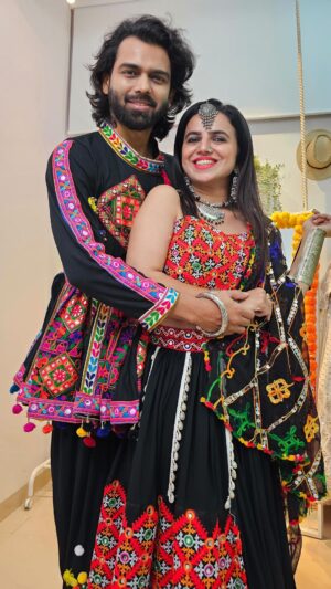 Bhavini Purohit Instagram - 5/9 Navratri fits ! Rate our outfit in comments from 5 🫶🏻
.
This Navratri outfits are also available on Rent, for more details DM @loveandlabelsbyhemakshii 
.
My outfit- @loveandlabelsbyhemakshii 
Dhaval’s Outfit- @loveandlabelsbyhemakshii 
.

My jewellery- @gehnacollections 
MUH- @pastelpalettes_manali 
.
.
#influencer #style #navratri #dandiya #couple #couplegoals #dance #gujju #sunburn #fashionstyle #navratrispecial #designer #outfits #bhavinipurohit