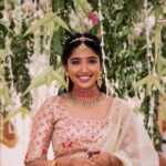 Deepika Venkatachalam Instagram - #WeddingLookBook ( Engagement : 1/4 ) Your D is back with a styling series again, and this time, it's for our #RnDwedding. Ah Still feels surreal :")🧿 The first outfit I wore for this special occasion was nothing short of magical. It was a breathtaking lehenga with a panelled skirt and a stunning hand-embroidered crop top. My stylist @artra1210 wanted it to be both traditional and modern, so I can reuse it forever 😅 . @fiorebymalar_ Akka spent days working on the crop top and made sure it looked royal as well. 🥹 Everyone loved how the top and skirt complemented each other and blended with the Kerala theme. But ena dhan plan panaaalum., konjam sodhapum la .. 😅 Long story short- I missed my dupatta. (Watch our engagement film on YouTube to know what happened later then. Dupatta vechi Oru kutty promotion.hehe) As it was getting late for the ceremony, @artra1210 instantly got an idea to snatch a dupatta from one of my bridesmaids. 😂 And she legit styled it in a way it matched my whole outfit! -(This is why you need a wedding stylist brooo ❤️) “Ponnu naa dhan but naa potruka dupatta endhu ila“ 😂 We wanted both pieces of the outfit to be staple pieces so that they could be styled in different ways in the future and still look like a complete outfit even without the dupatta & I think we achieved the goal. For the jewellery styling, we were initially confused. But, the pro @artra1210 was so confident and decided to go for jewels that matched the crop top's colour. The beautiful outfit became even more stunning with the matching choker, head Tikka, and bangles from @rimliboutique ❤️ The outfit, makeup by @kabooki_mua , jewellery by @rimliboutique and decor by @tharunam.in came together beautifully, and with the vibrant smiles of our friends and family, it felt like a royal engagement. My then-fiancé and now-husband approved of my look at first glance and made me feel like a royal princess on our engagement day. So, does my #instafam approve of it? Let us know in the comments! 🌝 . 📸 @photonimage_by_daran . #RnDwedding #Engagement