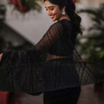 Deepika Venkatachalam Instagram - Black Saree - A Timeless Classic🖤 ft @bespoke.dhishya ✨ The moment I came to know that we were nominated for the She Awards, I knew I should look great on the day, no matter if we won the black lady or not. The first person I called was Pavi @artra_styling , (she was the one who did our engagement styling) and when I told her about the award nominations she was more excited than us and was in full swing to make me look my best on our big day. Pavi suggested a black saree look to keep the simple and ethnic girl-next-door vibe ON and to match the aesthetic of the award- the black lady. We were searching for a lot of options and the one look that grabbed our attention in an instant and made us head over heels in love was this black sequin saree from @bespoke.dhishya 🖤 It looked perfect for an award show and I’m sure I’d restyle it for my cousin’s or friend’s reception too. ( Receptions and Black! Hehe. 🙈 iykyk) For the blouse we decided to go classic with full sleeves and a boat neck and team @d.sign.d were sweet enough to do it in the last minute for us with full embroidery and perfectly delivered it in no time. 101 reasons why I go back to them, again and again ✅ To keep the attention on the saree, Pavi suggested only a white stoned flower motif designed ring and earring from @aaranyarentaljewellery and it was just perfect! 💎 We wanted to keep the makeup & hairdo minimum and @athmika_makeupstories gave a subtle look just like how I wanted and @priyaprabu_artistry did a super cute ponytail that elevated the whole look beautifully. When I stepped out of my room all dolled up, Amma was so stunned looking at me and loved the whole look. Enna thaan veliya 1000 peru sonnalum, Amma solra "Azhagaa irukaa dii" is always special laa?🥹 We quickaahh went to the terrace and clicked some beautiful pictures before we went to the event. And that night we were back home with the Black Lady on our hands. Always grateful for that night and the love I received 🖤 But now looking at the pictures makes me think this would be a classy look for a Diwali evening party. 🔥 #DiwaliwithD (8/10) What say guys?🌝 . 📸 @mukesh__dm . #deepika #diwaliwithD #chennaiinfluencer