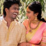 Deepika Venkatachalam Instagram - #Weddinglookbook Kerala themed Engagement (5/5) 💕✨ After that breathtaking lehenga, it was time to change for "Ring Exchange" 💍 and we had no heart to change the mood board and color palette for the second outfit! But wanted a quick changeover and went for this pleasantly beautiful gold saree that had a blush pink border adorned with motifs of the tree of life from @muhurth.brand ❤️ We looked into 50+ sarees from multiple brands but my heart said "Go for this" RVP approved too! 🫶🏼 The saree by itself was a beauty and just to add some grace to it we went on to experiment with blouse designs. That's exactly when @d.sign.d came in and gave us a lot of ideas & finally our choice was this blouse with intricate embroidery that added a hint of simplicity, sophistication and tradition to the overall look❤️ Nextuhhhh....Jewelsuhh😌 Our pro stylist @artra_styling suggested to go for a bright temple look jewelery with bright red stones and emeralds to amp up the saree and I abided by it only to find the perfectly looking set from @vriksham that definitely added the touch of gorgeousness. ✨ Oh yes, for my groom! 🫶🏼 Raja wanted the changeover for the ring exchange to be simple. He preferred a "Veshti" and our stylish gave us the choice of pairing it with a Kurta in the same golden shade. As always, his silk veshti and his silk fabric for the kurta were picked from Nalli! We took it all to our Malar Akka @fiorebymalar_ and she made the kurta that looked so good on him! 🥺🫶🏼 Like I said he wanted minimal dress up and just went ahead with his chain and bracelet only! I must admit it all fell in place so beautifully for both of us and we got lucky to figure out the finest people around us to ensure everything fell in place and our day was indeed filled with love and love only! 🫶🏼💕 . 📸 @photonimage_by_daran Decor @tharunam.in Jewellery @vriksham Saree @muhurth.brand Blouse @d.sign.d Styling @artra_styling Makeup @kabooki_mua . #RnD #RnDwedding