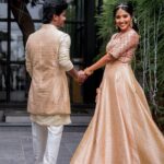 Deepika Venkatachalam Instagram - #Weddinglookbook A kerala themed - Engagement 💕 (2/5) The moment we decided to have our Engagement depicting Kerala, we were sure to have our outfits reflecting their culture in a unique way that would speak D & RVP. Stylist pavi @artra1210 to our rescue and she quickly narrowed down to the mood boards of Ravivarman paintings. That was it! The next morning we found ourselves at @nallisilksarees since it is an emotion in Chennai, a brand that is known for hand woven silks with the authenticity and quality. I think all of us would have brought something from Nalli during our childhood. La ? 🥹 Shopping for fabrics was so joyful & in no time our eyes fell on a pure hand-woven brocade silk fabric. I turned towards for her approval and she came up with something so thoughtful. She said we can use this same fabric for my lehenga and Raja's jacket. 🫶🏼 I fell for it! ❤️ Next up was scouting a fabric for my top and we found a beautiful pink! Our forever favourite @fiorebymalar_ worked along with our Pavi for days together for this outfit that I dreamt myself in everyday until the big day. It was a sure head turner for me as well when I had the first look at the whole outfit. Don't you feel the same? 🥰 While Raja wanted his outfit to be subtle & minimal we went on shop a nice Kurta set from @myntra and paired it along with the jacket designed by Pavi (@artra1210 ) and made by Malar akka. ( @fiorebymalar_ ) My jewellery from @rimliboutique and Raja's shoes from @lifestylestores added some more charm to the whole ensemble!! The whole outfit planning went on for days before it became a reality and we cannot be more proud about our stylist & designer for giving us these fairytale kinda looks 🤍 More to come from our close to heart happy Kerala themed engagement that showered white and enormous love!🤍🫶🏼 . 📸 @photonimage_by_daran Decor @tharunam.in Makeup & hair : @kabooki_mua . [ Check the YT link ( in my bio) to watch the engagement film ] . #RnD #RnDwedding