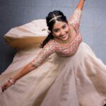 Deepika Venkatachalam Instagram - #WeddingLookBook ( Engagement : 1/4 ) Your D is back with a styling series again, and this time, it's for our #RnDwedding. Ah Still feels surreal :")🧿 The first outfit I wore for this special occasion was nothing short of magical. It was a breathtaking lehenga with a panelled skirt and a stunning hand-embroidered crop top. My stylist @artra1210 wanted it to be both traditional and modern, so I can reuse it forever 😅 . @fiorebymalar_ Akka spent days working on the crop top and made sure it looked royal as well. 🥹 Everyone loved how the top and skirt complemented each other and blended with the Kerala theme. But ena dhan plan panaaalum., konjam sodhapum la .. 😅 Long story short- I missed my dupatta. (Watch our engagement film on YouTube to know what happened later then. Dupatta vechi Oru kutty promotion.hehe) As it was getting late for the ceremony, @artra1210 instantly got an idea to snatch a dupatta from one of my bridesmaids. 😂 And she legit styled it in a way it matched my whole outfit! -(This is why you need a wedding stylist brooo ❤️) “Ponnu naa dhan but naa potruka dupatta endhu ila“ 😂 We wanted both pieces of the outfit to be staple pieces so that they could be styled in different ways in the future and still look like a complete outfit even without the dupatta & I think we achieved the goal. For the jewellery styling, we were initially confused. But, the pro @artra1210 was so confident and decided to go for jewels that matched the crop top's colour. The beautiful outfit became even more stunning with the matching choker, head Tikka, and bangles from @rimliboutique ❤️ The outfit, makeup by @kabooki_mua , jewellery by @rimliboutique and decor by @tharunam.in came together beautifully, and with the vibrant smiles of our friends and family, it felt like a royal engagement. My then-fiancé and now-husband approved of my look at first glance and made me feel like a royal princess on our engagement day. So, does my #instafam approve of it? Let us know in the comments! 🌝 . 📸 @photonimage_by_daran . #RnDwedding #Engagement