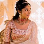 Deepika Venkatachalam Instagram - #WeddingLookBook ( Engagement : 1/4 ) Your D is back with a styling series again, and this time, it's for our #RnDwedding. Ah Still feels surreal :")🧿 The first outfit I wore for this special occasion was nothing short of magical. It was a breathtaking lehenga with a panelled skirt and a stunning hand-embroidered crop top. My stylist @artra1210 wanted it to be both traditional and modern, so I can reuse it forever 😅 . @fiorebymalar_ Akka spent days working on the crop top and made sure it looked royal as well. 🥹 Everyone loved how the top and skirt complemented each other and blended with the Kerala theme. But ena dhan plan panaaalum., konjam sodhapum la .. 😅 Long story short- I missed my dupatta. (Watch our engagement film on YouTube to know what happened later then. Dupatta vechi Oru kutty promotion.hehe) As it was getting late for the ceremony, @artra1210 instantly got an idea to snatch a dupatta from one of my bridesmaids. 😂 And she legit styled it in a way it matched my whole outfit! -(This is why you need a wedding stylist brooo ❤️) “Ponnu naa dhan but naa potruka dupatta endhu ila“ 😂 We wanted both pieces of the outfit to be staple pieces so that they could be styled in different ways in the future and still look like a complete outfit even without the dupatta & I think we achieved the goal. For the jewellery styling, we were initially confused. But, the pro @artra1210 was so confident and decided to go for jewels that matched the crop top's colour. The beautiful outfit became even more stunning with the matching choker, head Tikka, and bangles from @rimliboutique ❤️ The outfit, makeup by @kabooki_mua , jewellery by @rimliboutique and decor by @tharunam.in came together beautifully, and with the vibrant smiles of our friends and family, it felt like a royal engagement. My then-fiancé and now-husband approved of my look at first glance and made me feel like a royal princess on our engagement day. So, does my #instafam approve of it? Let us know in the comments! 🌝 . 📸 @photonimage_by_daran . #RnDwedding #Engagement