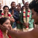 Deepika Venkatachalam Instagram - And then, this magic happened through the golden hour, amidst the sounds of our traditional nadaswaram and parai, with colourful ribbons flying all over us & the breeze causally hitting our faces! We knew we were being blessed by our favourite gods when we tied the knot whilst finding our homes in each other's eyes! :’) 🫶🏼 #RnD #RnDWedding #JustMarried #RVPxDeeps #OurFairyTale . 📸 @sakshi.ramakrishnan Decor @vizhamedai Makeup @snehamnj Styling @stylingbysamiha Jewellery @quillsspills