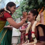 Deepika Venkatachalam Instagram - Day 2: Nalangu 🤍 I can't help but relive the magical moments of my Nalangu, feeling like a royal bride all over again. As I stepped into the nalangu venue, my entire family was present, adorned with heartfelt smiles, welcoming me like a princess. Their positive aura filled the place with uplifting vibes. Giggles and laughter began to flow as I sat there, embraced by my loving family. Whether it be my mom shedding happy tears at the sight of me all dolled up, my akka beaming with sheer happiness, or every member of my family being extra careful with the sandhanam to simply not smudge my makeup, ( how cute and thoughtful 🥹 )my heart will forever hold onto these moments. Amidst the joy and laughter, the unconditional love from my loved ones made me feel truly blessed. It was a day filled with love, laughter, and beautiful memories!!🥹🧿 . 📸 @sakshi.ramakrishnan . Saree : @saaramati Decor : @vizhamedai Makeup : @vishualizemua Hair : @saisubha_hairstylist . #RnD #RnDwedding