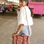 Deepika Venkatachalam Instagram - POV: A day in my life...(1/4) One morning I had to decide to just take a stroll and travel through the city and look where I landed..! “A bus stand” 📍🚎 A place where mass floating population walks in and out through any day. A whole surrounding where emotions run high for each one boarding a bus. I saw college goers with bags and dreams, office goers wearing ID cards and wondering about their day and many more people who had so much work to do in the day trying to board their bus. It took me a minute to realise I was definitely privileged where I could afford a cab if I really wish while there are a lot outside who wait for a bus even upon an emergency. I just took a minute to send some prayers, luck and love to all those eyes I met that day at the bus stand to reach their dreams, wishes and desires and smile throughout their lives. 🤍 Littlest of what we could do, right? 😍 Also, with summer 🌞 scorching the city I wanted to stay simple and wore a chic white shirt and a pair of well fitted jeans! Carried a pretty printed bag ( @zoukonline ) with me to put in everything from a phone to keys to wallet to literally every damn thing. These printed bags are something very Indian and carry an aesthetic with any kinda outfit! 💟 . . Yeah, I had another planned to visit elsewhere and stay tuned to know more! ➡️ . 📸 @keshu_hariharan @thatmadraskaran . #deepika #chennaiblogger #chennaiinfluencer