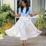Deepika Venkatachalam Instagram - One of Deepu's personal favourite outfit that was such a well fit into Abi's wardrobe! Ft @thehazelavenue 💙 I absolutely loved this outfit so much at first sight itself. I somehow love this powder blue colour off late and been adding more outfits in this shade. A solid round neck top with comfortable sleeves! Paired it with a multi shaded pleated skirt, just to totally look like an ice cream in real. 🍦😂 I've been feeling like I'm really in school wearing this outfit and it definitely had to take a place into Abi's wardrobe collection. Any guesses as to where I wore this dress in #kanakaanumkaalangal ? 💭. . 📸 @arunsmagy . #deepika #abi #kanakaanumkaalangal #stylewithdeepu #chennaiblogger #chennaiinfluencer #pleatedskirt #styling