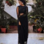 Deepika Venkatachalam Instagram - Black Saree - A Timeless Classic🖤 ft @bespoke.dhishya ✨ The moment I came to know that we were nominated for the She Awards, I knew I should look great on the day, no matter if we won the black lady or not. The first person I called was Pavi @artra_styling , (she was the one who did our engagement styling) and when I told her about the award nominations she was more excited than us and was in full swing to make me look my best on our big day. Pavi suggested a black saree look to keep the simple and ethnic girl-next-door vibe ON and to match the aesthetic of the award- the black lady. We were searching for a lot of options and the one look that grabbed our attention in an instant and made us head over heels in love was this black sequin saree from @bespoke.dhishya 🖤 It looked perfect for an award show and I’m sure I’d restyle it for my cousin’s or friend’s reception too. ( Receptions and Black! Hehe. 🙈 iykyk) For the blouse we decided to go classic with full sleeves and a boat neck and team @d.sign.d were sweet enough to do it in the last minute for us with full embroidery and perfectly delivered it in no time. 101 reasons why I go back to them, again and again ✅ To keep the attention on the saree, Pavi suggested only a white stoned flower motif designed ring and earring from @aaranyarentaljewellery and it was just perfect! 💎 We wanted to keep the makeup & hairdo minimum and @athmika_makeupstories gave a subtle look just like how I wanted and @priyaprabu_artistry did a super cute ponytail that elevated the whole look beautifully. When I stepped out of my room all dolled up, Amma was so stunned looking at me and loved the whole look. Enna thaan veliya 1000 peru sonnalum, Amma solra "Azhagaa irukaa dii" is always special laa?🥹 We quickaahh went to the terrace and clicked some beautiful pictures before we went to the event. And that night we were back home with the Black Lady on our hands. Always grateful for that night and the love I received 🖤 But now looking at the pictures makes me think this would be a classy look for a Diwali evening party. 🔥 #DiwaliwithD (8/10) What say guys?🌝 . 📸 @mukesh__dm . #deepika #diwaliwithD #chennaiinfluencer