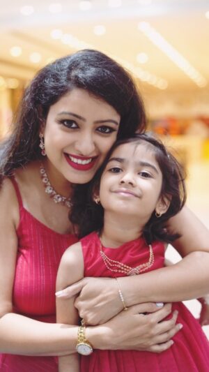Nisha Krishnan Instagram - Celebrate in Style this festive season with NAC Jewellers Festive sale. Shop and get upto 50% OFF on wastage, only till 1st October. 

I am ready to twin with my little one. 📿 What about you?

#momdaughter #jewellery #kidsjewellery #nacjewellers