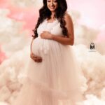 Nisha Krishnan Instagram - ECSTASY OF ANTICIPATION . The anticipation of a baby is what gives a special glow to the expectant mother ✨ • Studio & Maternity Gown - @artista_propshop •MUA- @kaviyaartistry_off •Outfit for @talk2ganesh - @his_studio • Creative set up - @vermiliondecors • Concept & Photography 📸 - @toddlersbyzerogravity . For bookings, contact: +919840767566 https://zerogravity.photography Shot on @canonindia_official . . . #love #maternity #bliss #pregnant #couple #happy #awaiting #instagood #zerogravityphotography