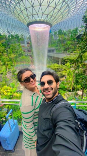 Shireen Mirza Instagram - And we have arrived to our anniversary destination‼️🤩
Celebrating 2 years of love and looking forward to ♾️ 

#trending #reelsinstagram #shireenmirza #fyp #singapore #changiairport #travelphotography #travel #travelgram #travelblogger #marriage #marriageanniversary #hasansartaj #destination #reelitfeelit